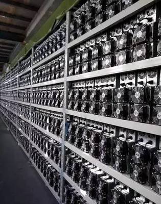 A large mining farm with rows of miners operating efficiently in a controlled environment.
