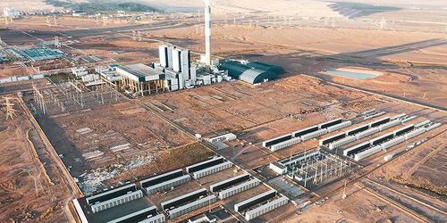 A mining farm with rows of mining rigs